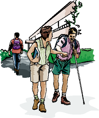 Two students walking on campus, engaged in a conversation. One female and one male with white cane