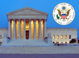 The Supreme Court building in the evening with their official seal